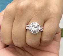 Load image into Gallery viewer, Oval Cut Moissanite and Round Cut Natural Side Diamond Engagement Ring Double Halo Set In 14k Solid White Gold Triple Shank Style 2.40ctw