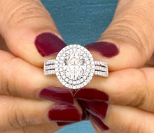 Load image into Gallery viewer, Oval Cut Moissanite and Round Cut Natural Side Diamond Engagement Ring Double Halo Set In 14k Solid White Gold Triple Shank Style 2.40ctw
