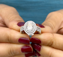 Load image into Gallery viewer, Oval Cut Moissanite and Round Cut Natural Side Diamond Engagement Ring Double Halo Set In 14k Solid White Gold Triple Shank Style 2.40ctw