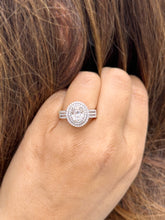 Load image into Gallery viewer, Oval Cut Moissanite and Round Cut Natural Side Diamond Engagement Ring Double Halo Set In 14k Solid White Gold Triple Shank Style 2.40ctw