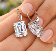 Load image into Gallery viewer, Emerald Cut IGI CERTIFIED Earrings Huge 6.00 Carat Prong set 14k Solid White Solid Gold Bridal Gift Wedding Engagement French Post Setting