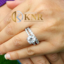 Load image into Gallery viewer, Round Cut Moissanites Engagement Ring And Matching Band Eternity Style Set In 14k Solid White Gold Bridal Ring Prong Set Wedding Ring 5.50ct