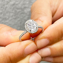 Load image into Gallery viewer, Oval Cut Moissanite and Round Cut Sides Natural Diamond Engagement Ring In 14k Solid White Gold Wedding Ring Halo Style Bridal Ring 2.00ctw