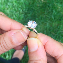 Load image into Gallery viewer, Large Four Carat set in 14k solid yellow gold round cut forever one moissanite engagement ring solitaire, bridal set, wedding, anniversary