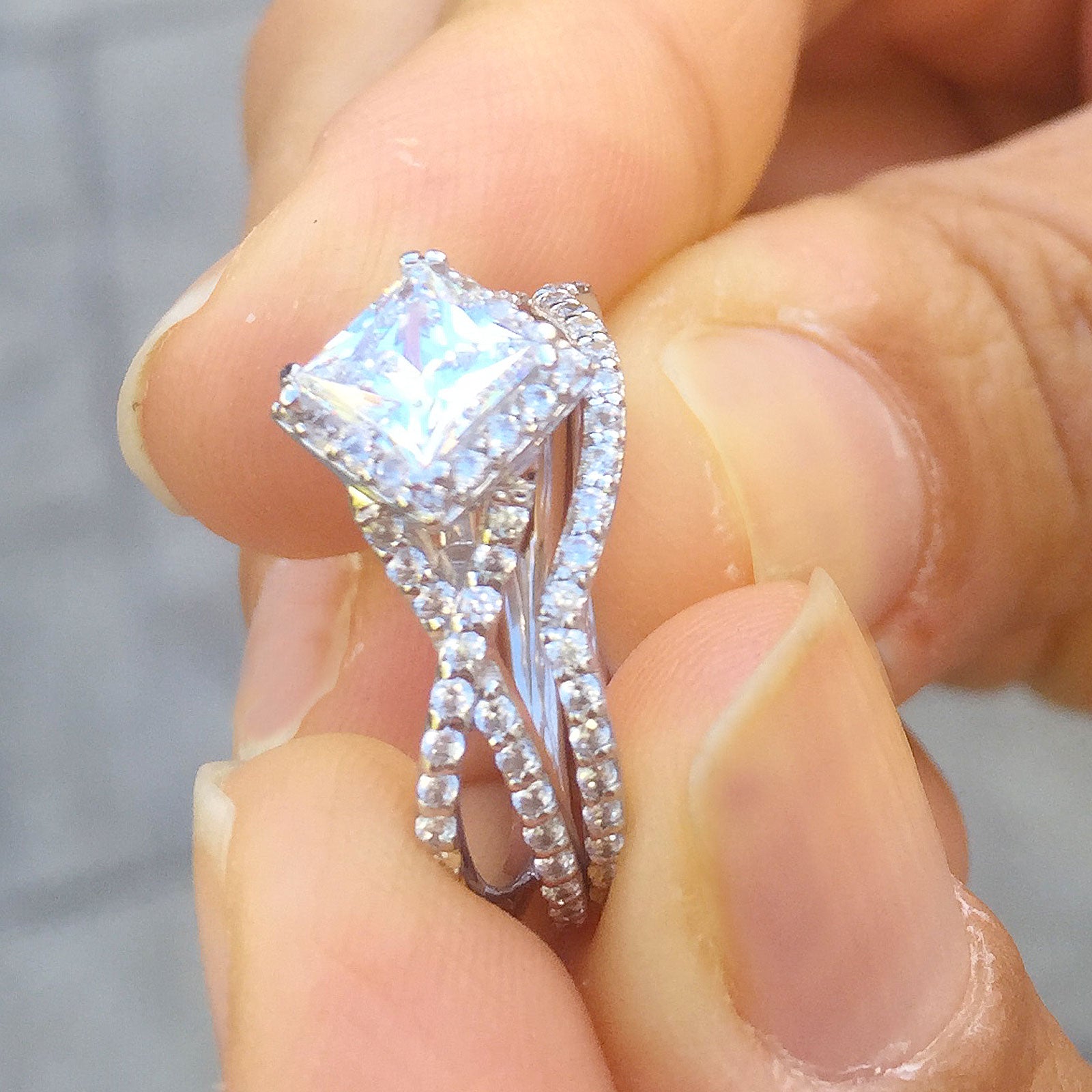 Twisted shank style 14K solid white gold princess cut moissanite