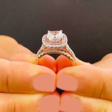 Load image into Gallery viewer, 14K White And Rose Gold Cushion Cut And Round Cut Diamond And Pink Sapphires Engagement Ring And Band Double Halo Prong Set 2.50ctw