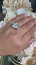 Load and play video in Gallery viewer, Huge 6.50 Carat Women's 14k solid white and yellow gold cushion cut moissanite and natural round cut diamond engagement ring