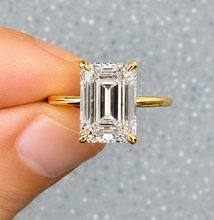 Load image into Gallery viewer, Emerald Shape Moissanite Center And Round Cut Sides Engagement Ring Inner Halo Style 14k Yellow Gold Wedding Ring 3.10ctw
