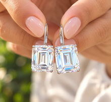 Load image into Gallery viewer, Emerald Cut IGI CERTIFIED Earrings Huge 6.00 Carat Prong set 14k Solid White Solid Gold Bridal Gift Wedding Engagement French Post Setting
