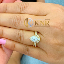 Load image into Gallery viewer, Pear Shape Moissanite And Round Cut Sides Natural Diamonds Engagement Ring And Matching Band Halo Style In 14K Yellow Gold Bridal Set 2.00ct
