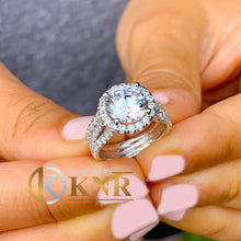 Load image into Gallery viewer, Round Cut Moissanite Engagement Ring Halo Style Set In Triple shank style Bridal Ring 14k Solid White Gold Women's Wedding Ring 4.20ctw
