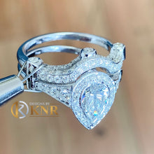 Load image into Gallery viewer, Pear Shape Moissanite and Round Cut Sides Natural Diamond  Bezel Set Halo Engagement Ring And Matching Band 14k Solid White Gold 2.50ctw
