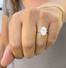 Load image into Gallery viewer, Oval Cut Diamond And Round Sides Engagement Ring IGI Certified 14k Solid Yellow Gold Bridal Ring Wedding Ring Hidden Halo Style 3.15ctw

