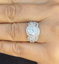 Load image into Gallery viewer, Round Cut Diamond Engagement Ring And Matching Band Three Stone Style IGI Certified 14k Solid White Gold Halo Bridal Wedding set 2.70ctw
