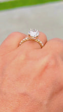 Load and play video in Gallery viewer, Oval Shape Moissanite And Round Cut Sides Engagement Ring Prong Set In 14k Solid Yellow Gold Wedding Bridal Ring Hidden Halo Style 4.00ctw
