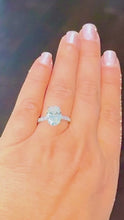 Load and play video in Gallery viewer, Oval Shape Moissanite And Round Cut Sides Engagement Ring Prong Set In 14k Solid White Gold Wedding Bridal Ring Hidden Halo Style 4.00ctw
