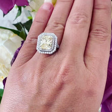 Load and play video in Gallery viewer, Huge Women&#39;s 14k solid white gold Light Fancy Yellow Radiant simulated and round cut natural diamond engagement ring Halo 6.00ct
